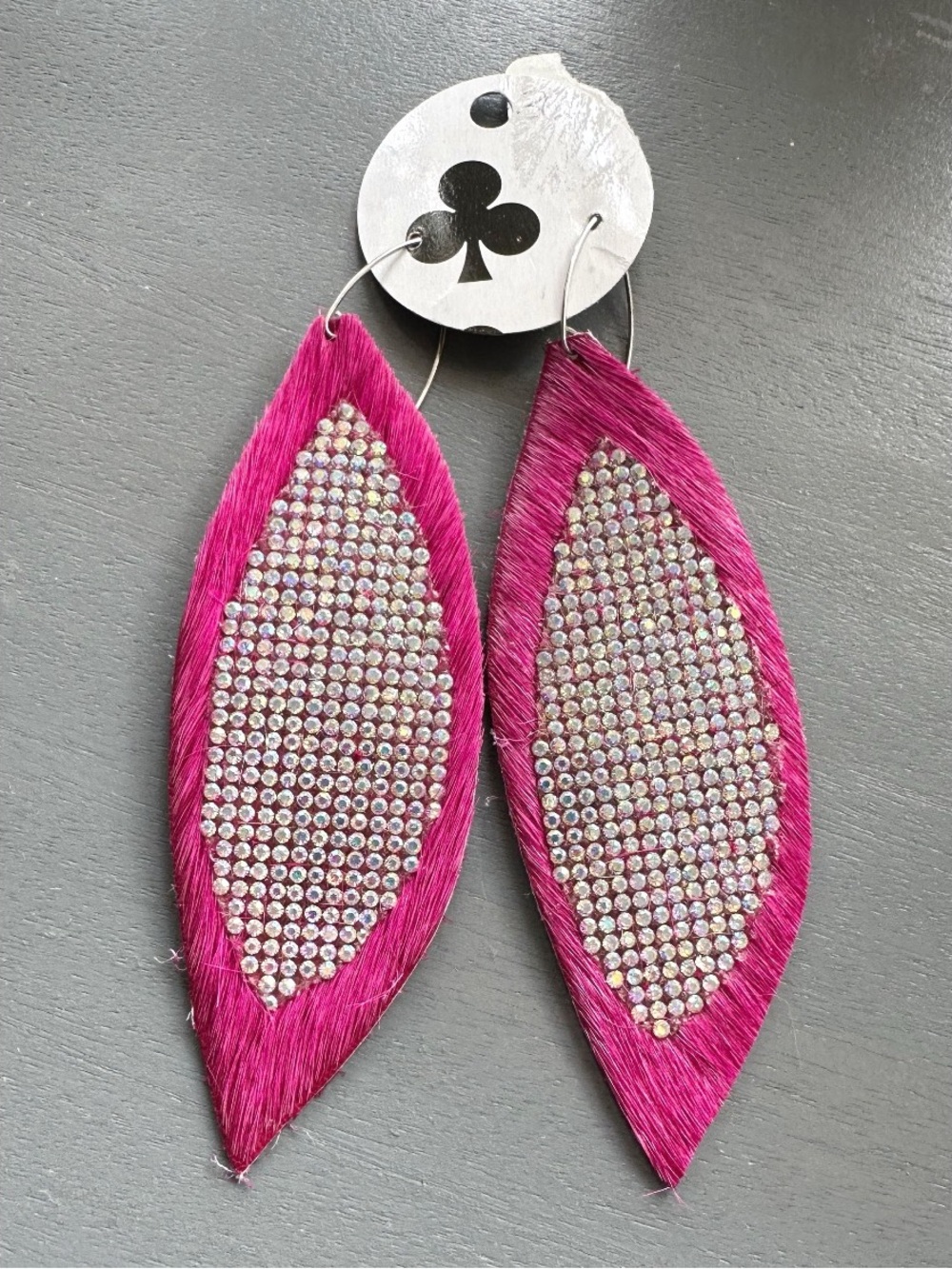 Sandra Ling hot pink earrings, pinched leaf design hair on hide leather